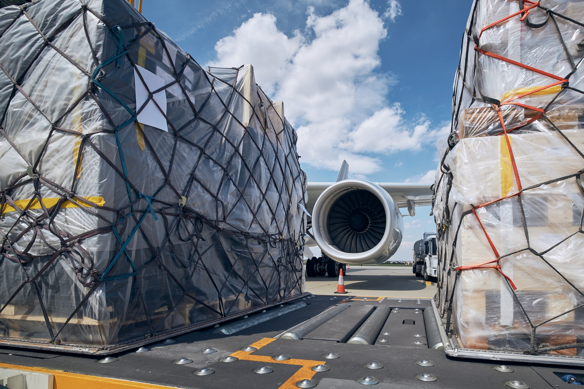 loading-of-cargo-containers-to-airplane.jpg